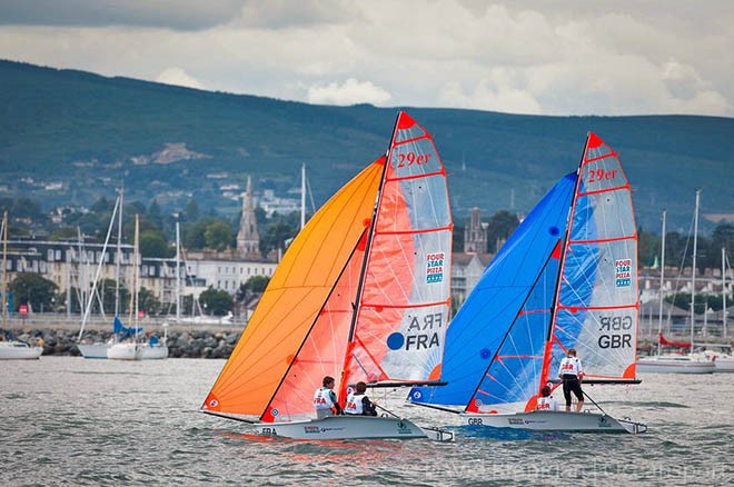 French and British 29er skiffs heading for shore after the final race of the ISAF Youth World Sailing Championships sponsored by Four Star Pizza on Dublin Bay, Ireland. © David Branigan - Oceansport.ie